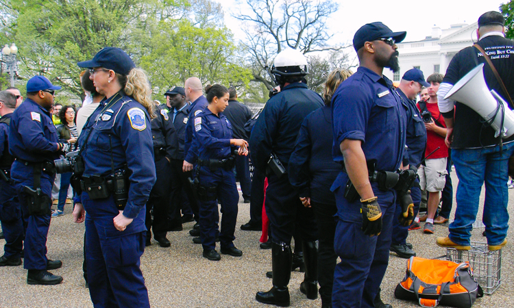 Officers keeping peace at the Reschedule 420 protest outside the White House
