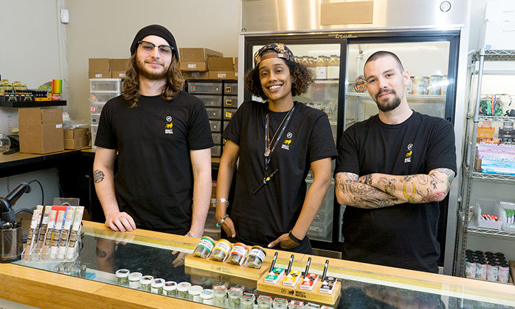 Budtenders at LA Patients and Caregivers Group with Marley Natural products